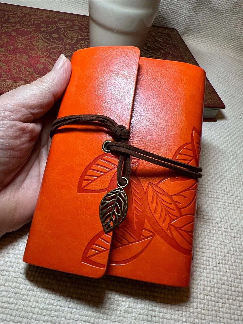 Handcrafted Orange Leather Leaf-Embossed Journal with Leaf Charm